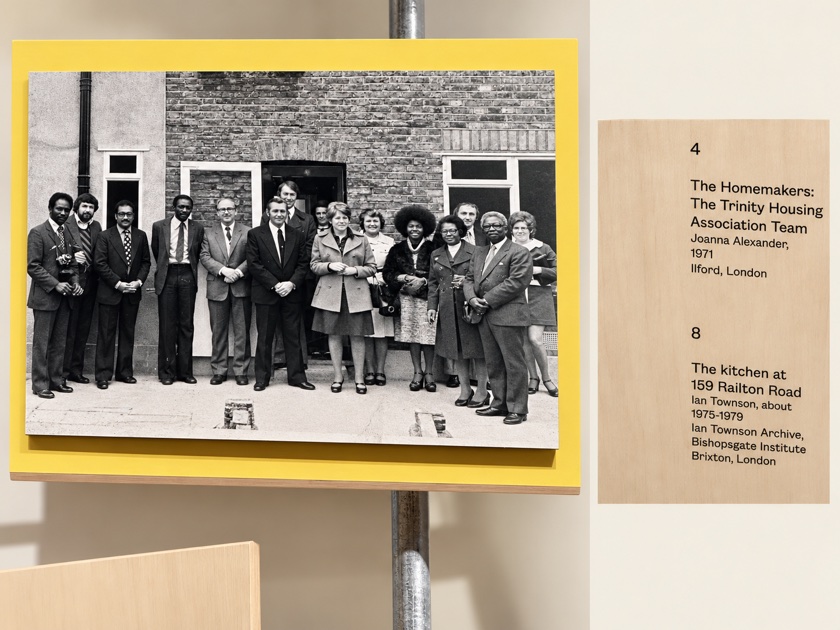 Trinity Housing Association team photograph installed on a yellow display panel at the Museum of the Home